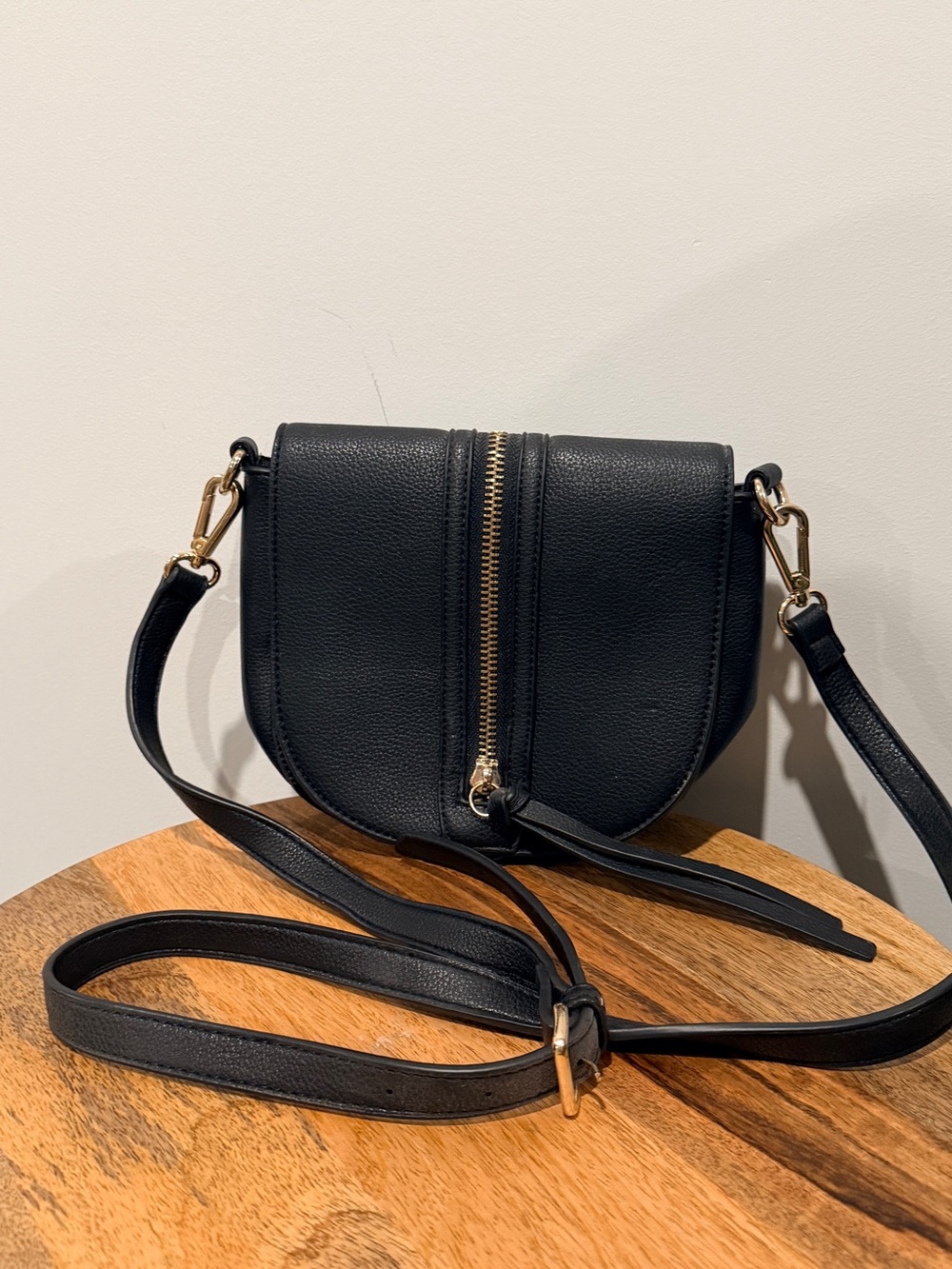 Black Leather Crossbody Saddle Bag with Gold Zip